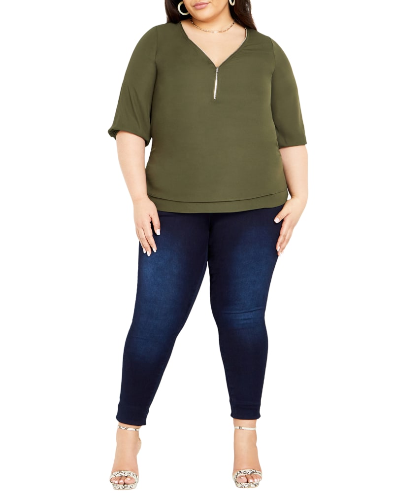 Front of a model wearing a size S Anna Half Zip Top in Jungle by City Chic. | dia_product_style_image_id:300369
